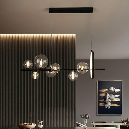 Long glass globe chandelier for a dining table