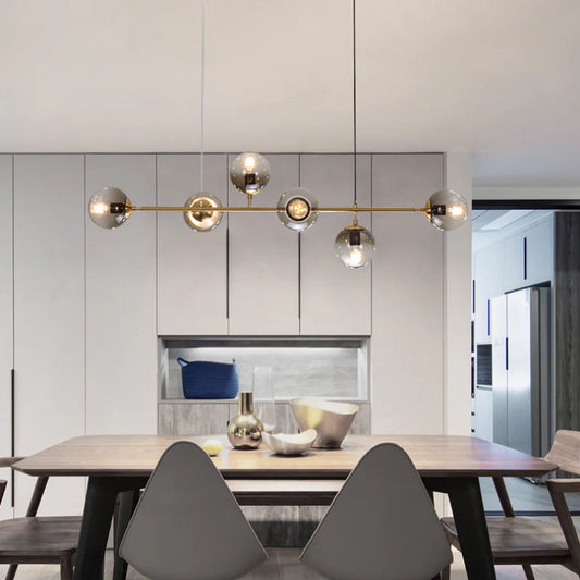 Orb chandelier with adjustable dining room placement