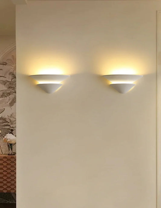 Pair of Wave Plaster Wall Lamps providing warm hallway light