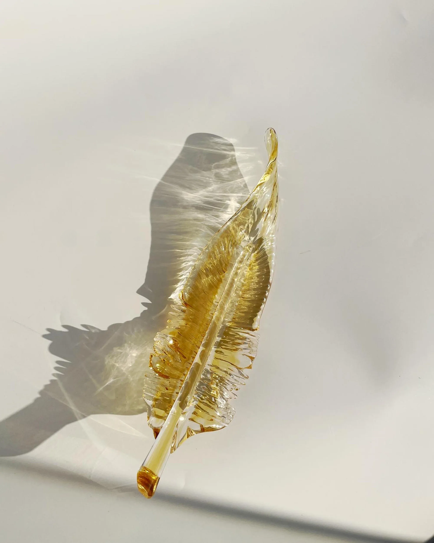 Amber Glass Feather Pendant