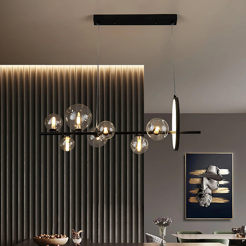 Long glass globe chandelier for a dining table