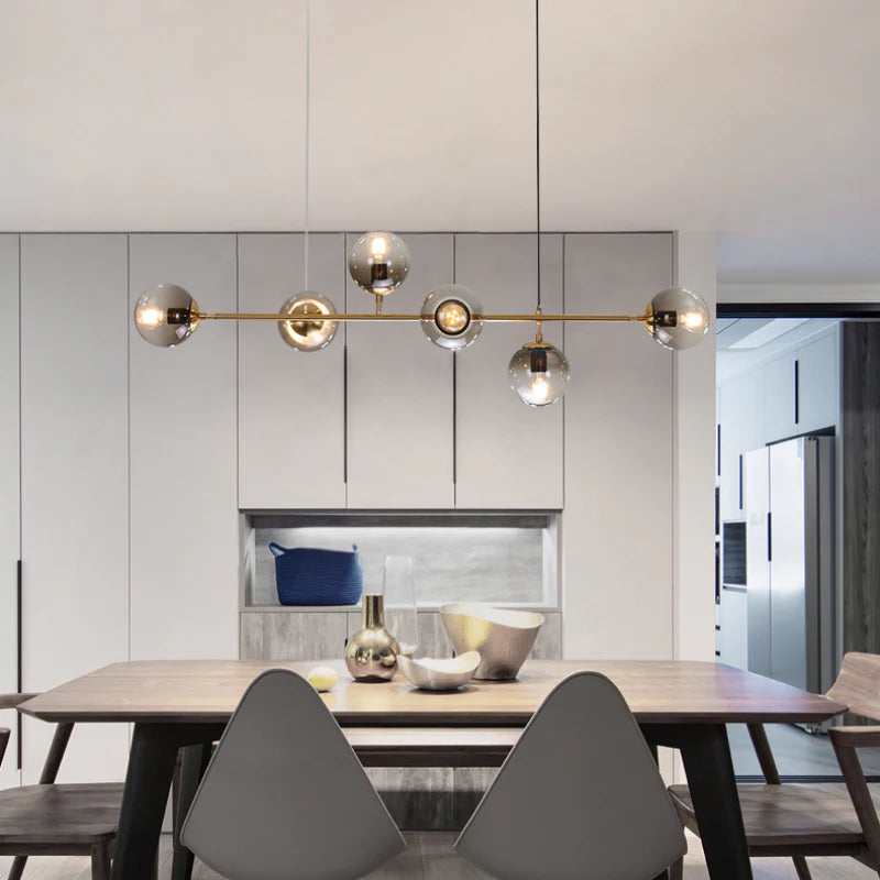 Orb chandelier with adjustable dining room placement