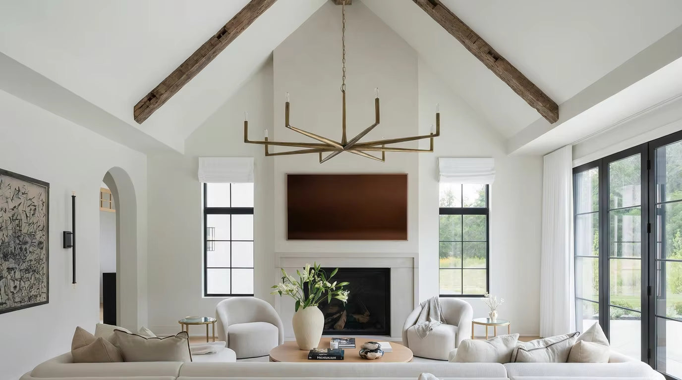 Luxury living room featuring a modern brass branch chandelier with vaulted ceilings and Emotional Luxury aesthetic by Loonglight